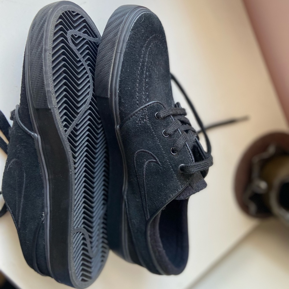 Black Nike suede slip on shoes
